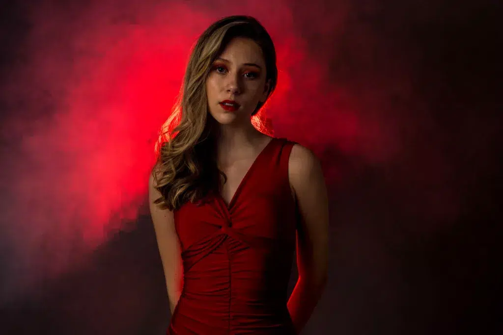 A person wears a red dress.
