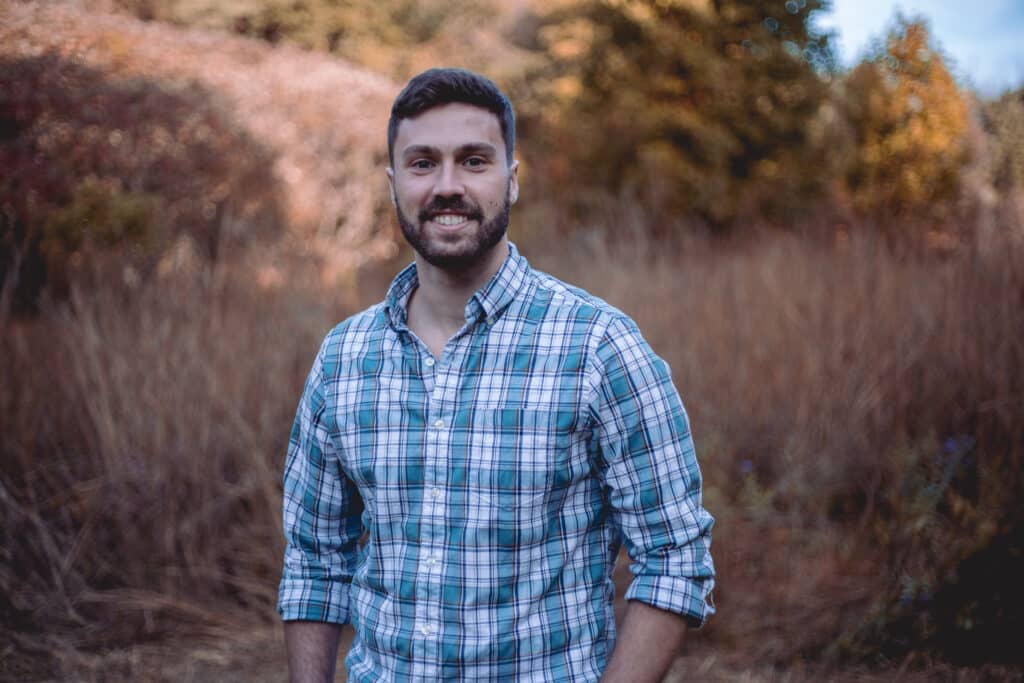 A Person Stands In A Field.