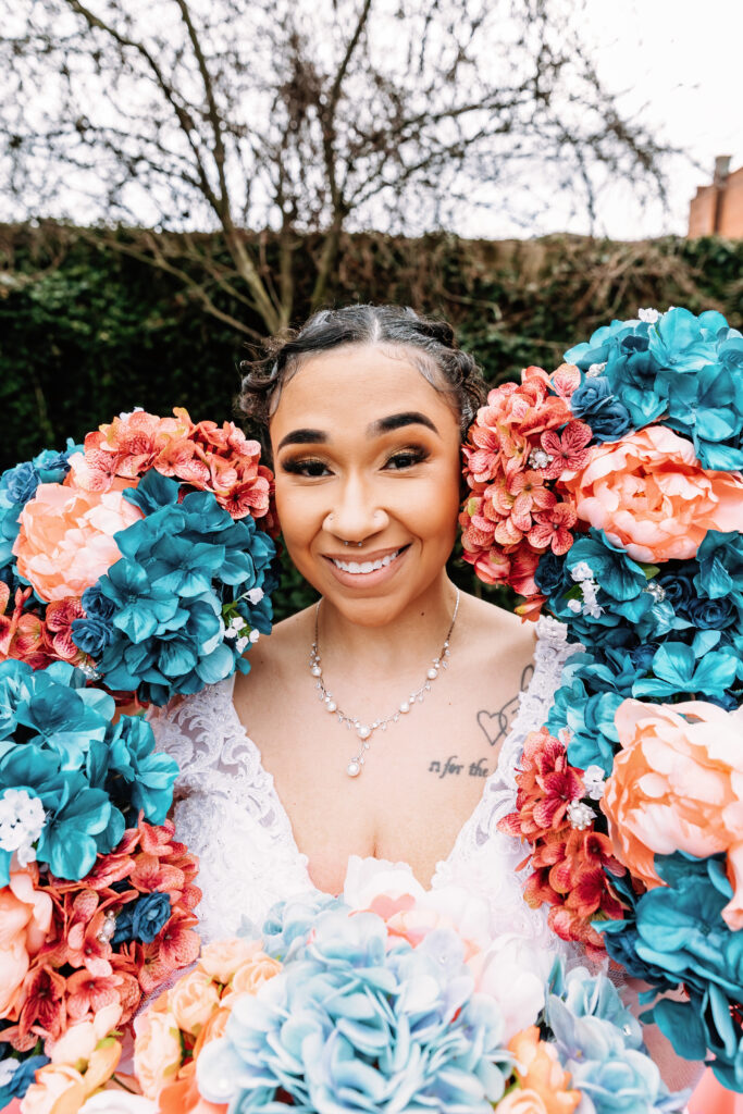 A woman surrounded by bouquets