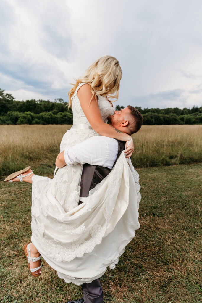 Bride and groom looking t each other